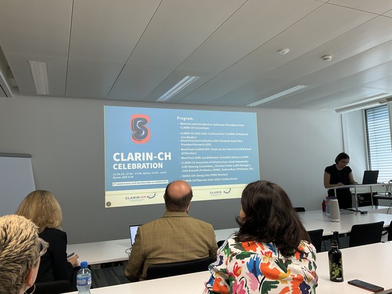 Opening slide of the event
CLARIN-CH
CELEBRATION
11.06.25, 15:30 - 17:00, Apéro: 17:00 - 18:00
Room: AND 4.06
5*h anniversary and membership in CLARIN ERIC
Program:
• Welcome and Introduction: Anita Auer (President of the
CLARIN-CH Consortium)
• CLARIN-CH 2020-2025: Cristina Grisot (CLARIN-CH National
Coordinator)
• Word from host institution UZH: Elisabeth Stark (Vice
President Research UZH)
• Word from CLARIN ERIC: Henk van den Heuvel (CLARIN Board
of Directors)
• Word from SERI: Lea Bühlmann…