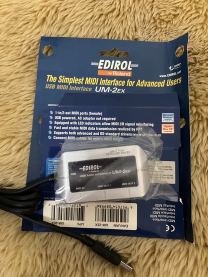 An Edirol UM2-EX USB MIDI interface, according to the package, “The Simplest MIDI Interface for Advanced Users.”