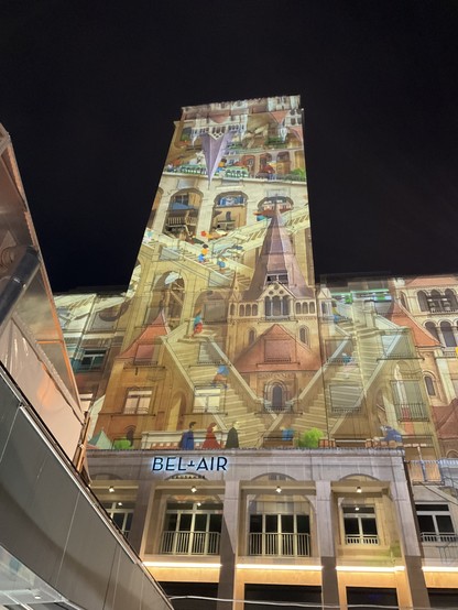Projection on the Bel-Air tower. An Escher-style composition of stairs and buildings.